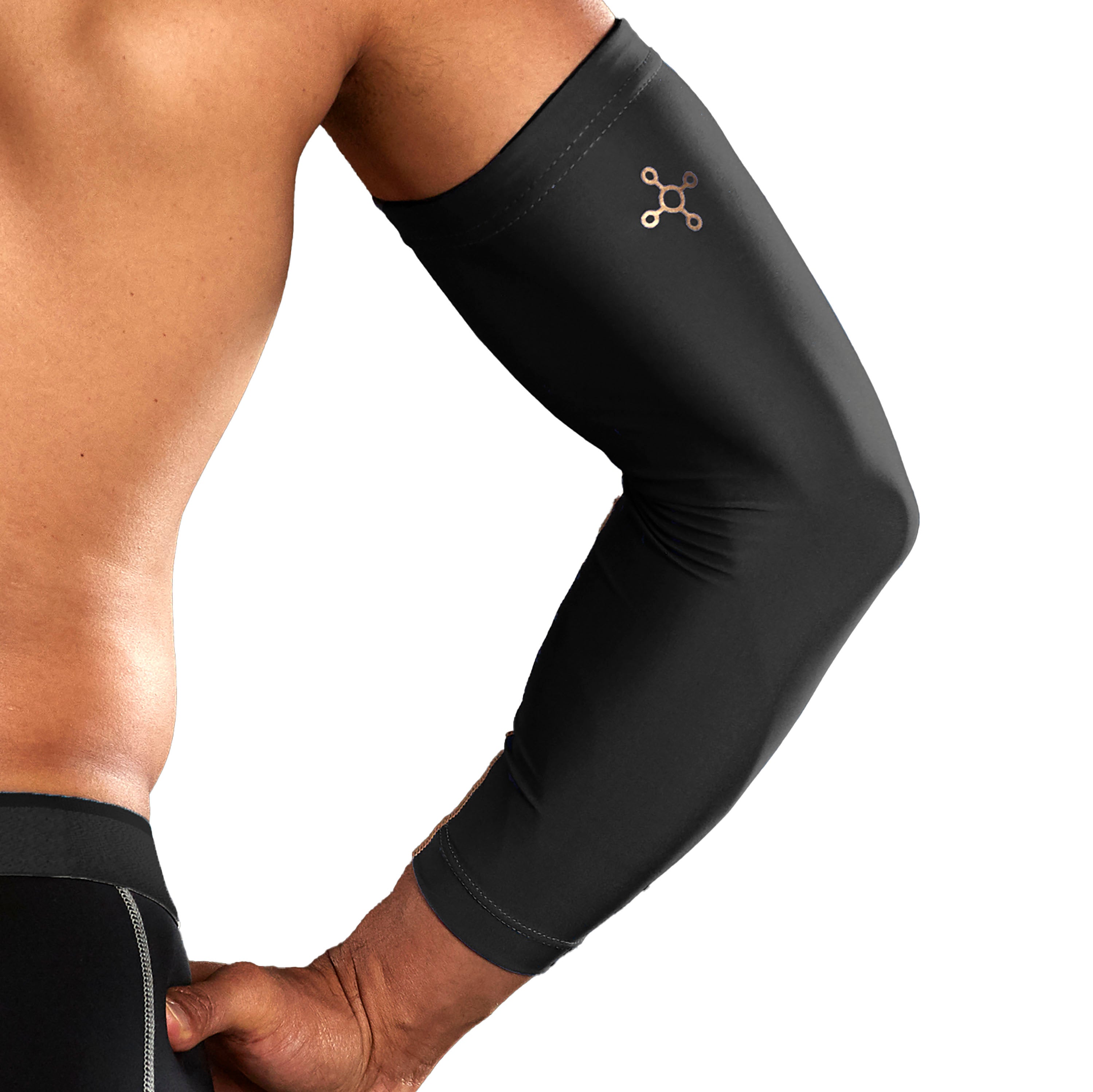 Black compression arm sleeve on a person's arm with a white background