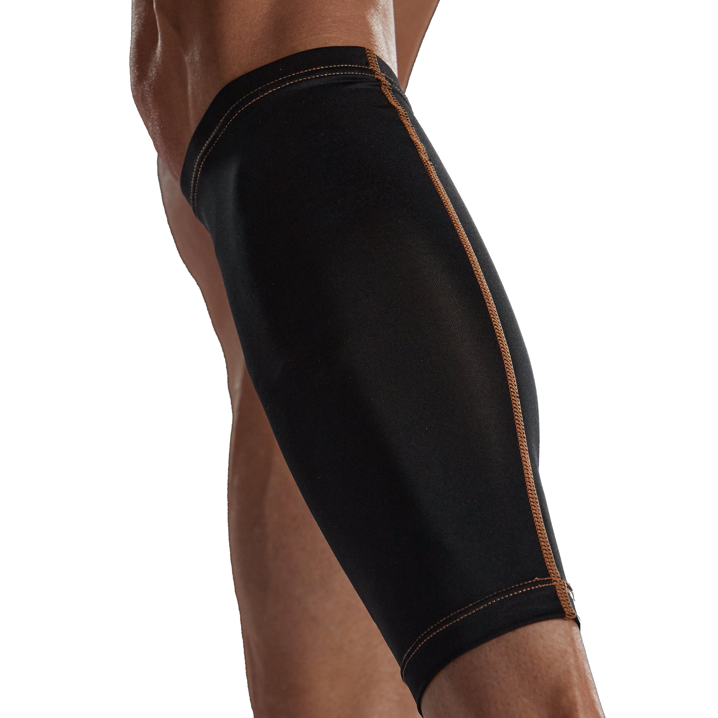 Black compression sleeve on a person's leg against a white background