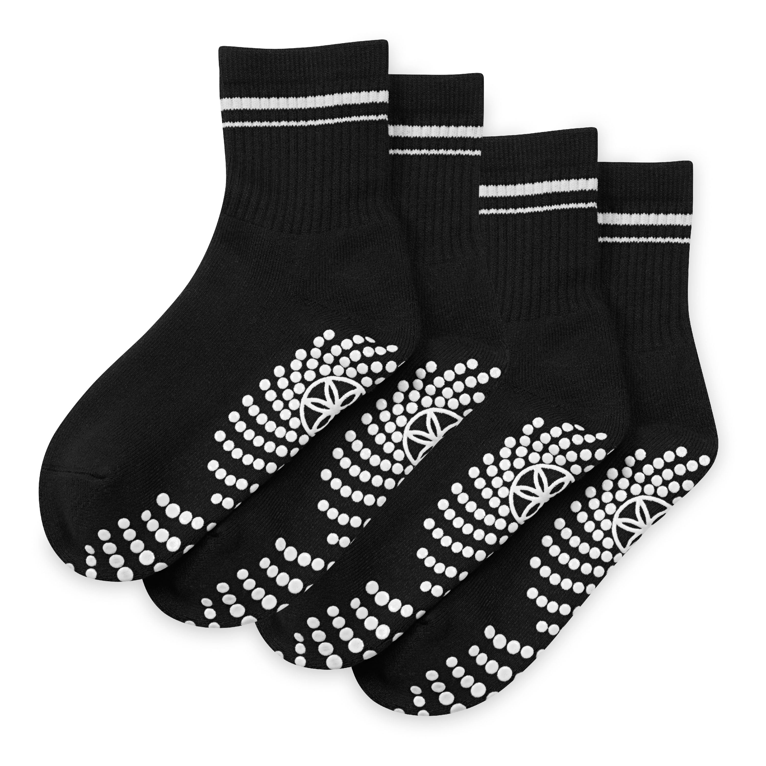 Set of black socks with white patterns on a white background