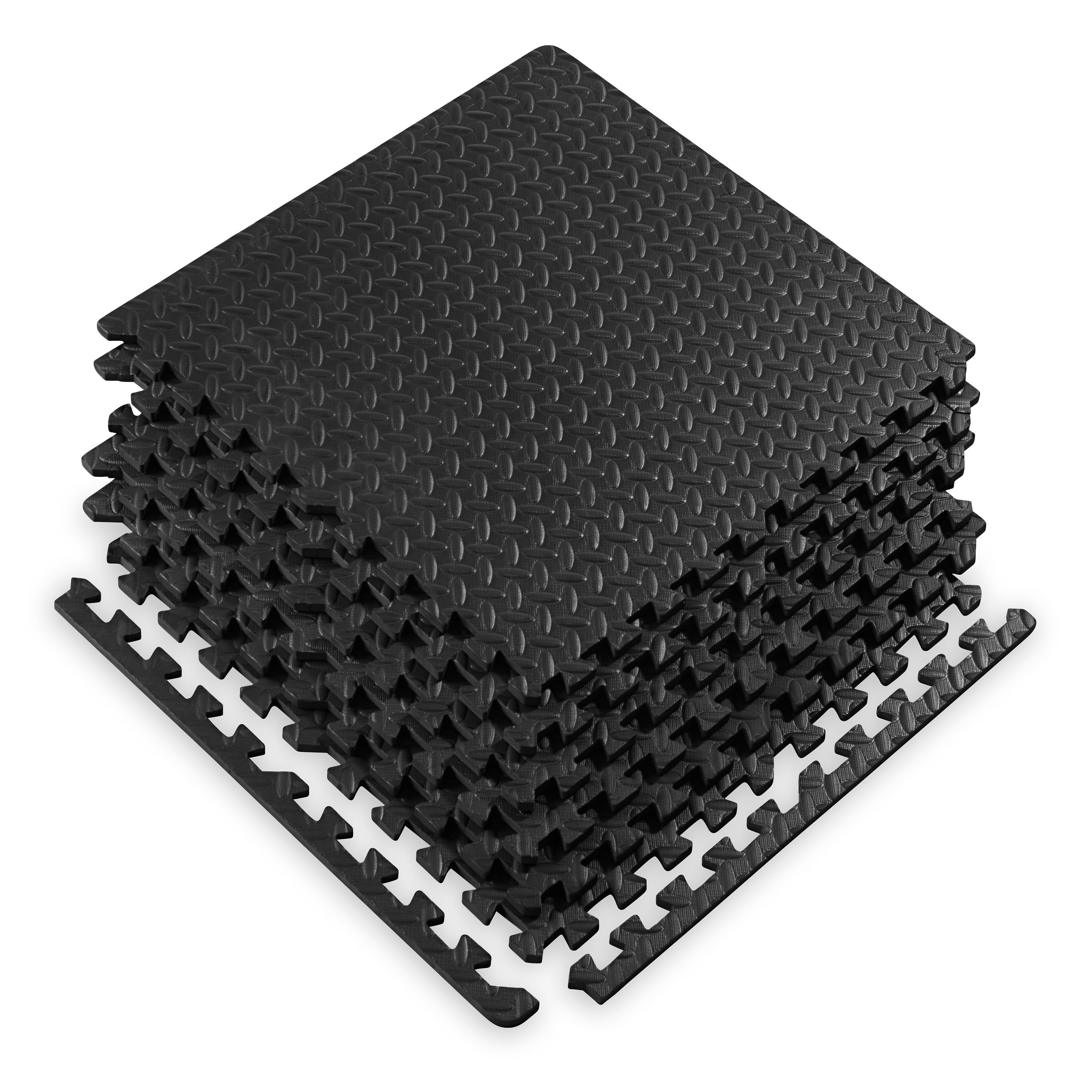 Stack of black interlocking foam mats on a white background