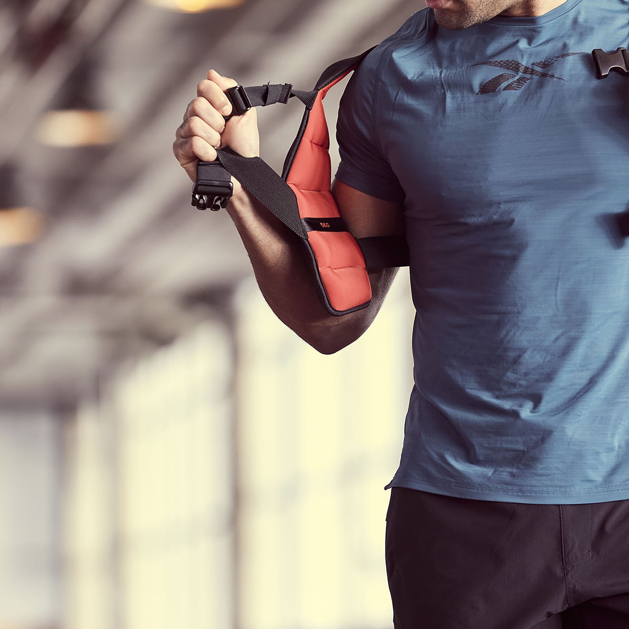 Reebok Strength Series Weight Vest on man detail inside